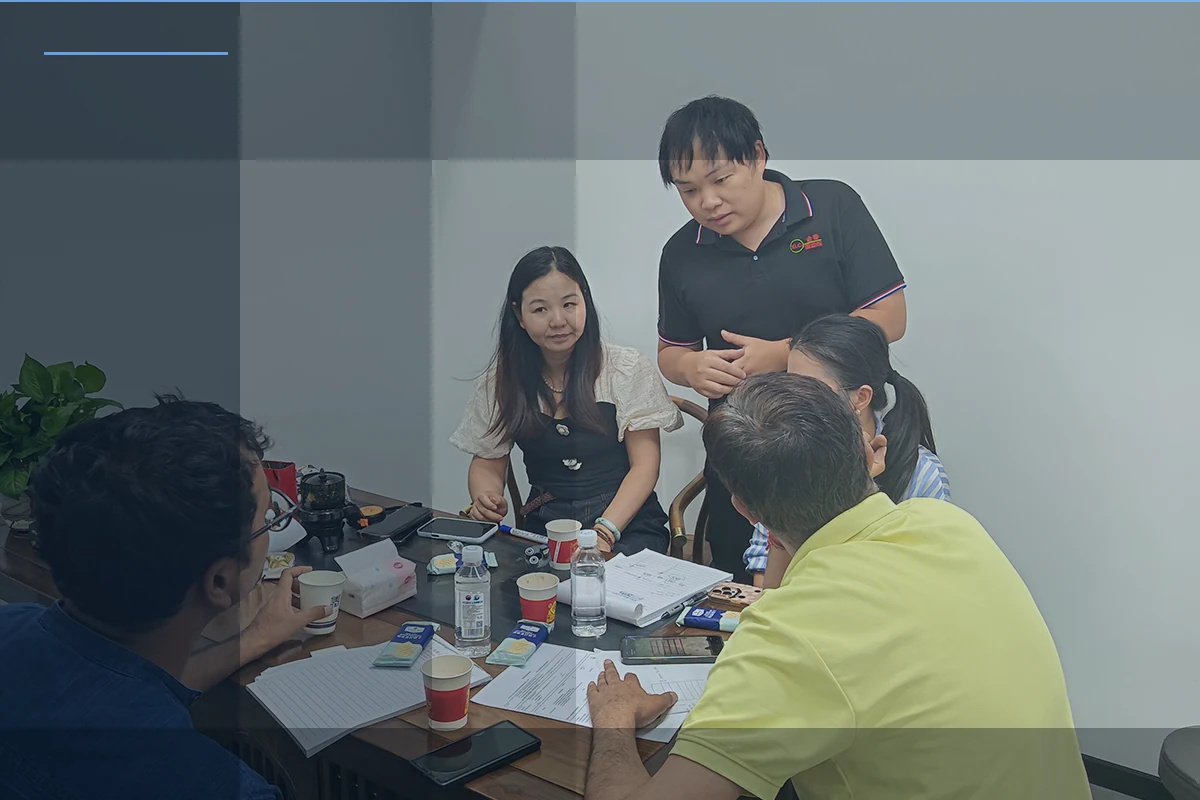 Customer and Jinchun team reviewing product and production requirements